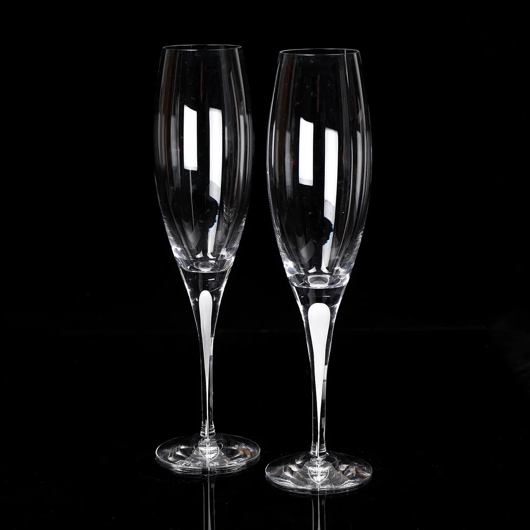 ERIKA LAGERBIELKE. Champagneglas, ett par, "Intermezzo Satin", Orrefors. — Tableware — Växjö Auktionskammare