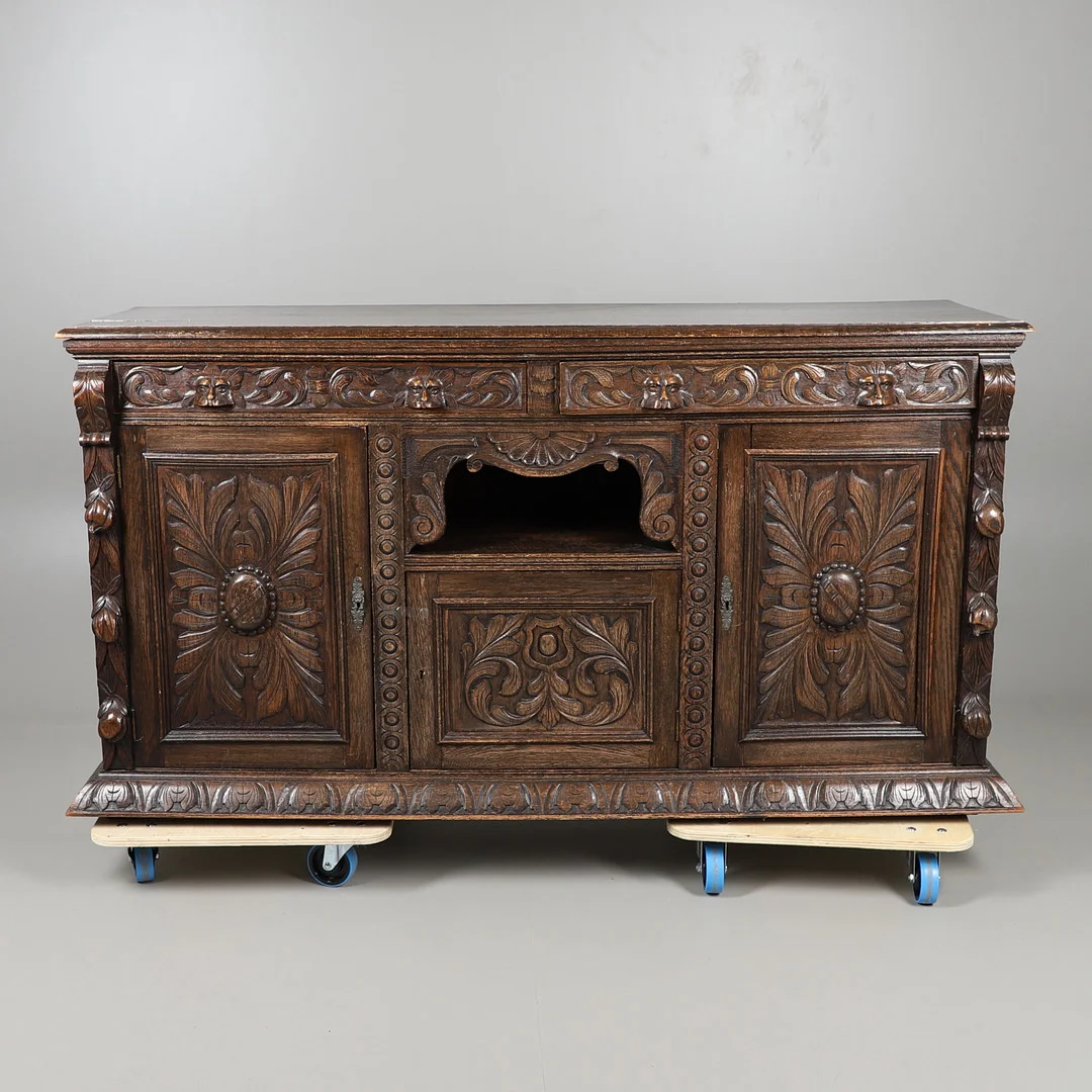 A VICTORIAN CARVED OAK SIDEBOARD. — Cupboards, Cabinets & Shelves — Lawrences Auctioneers