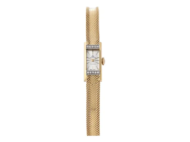 BUCHERER, damur, 10,5 x 23 mm, Boett nr. 1 219, 18K guld, manuell, plexiglas, formverk, diamanter på boetten (10 st. 8/8), integrerad originallänk, längd 152-155 mm, totalvikt 21,0 gram, ca 1965, box.