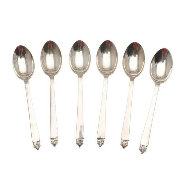 A SET OF SIX SILVER BRITISH HALLMARK ASSAY CITY TEASPOONS.