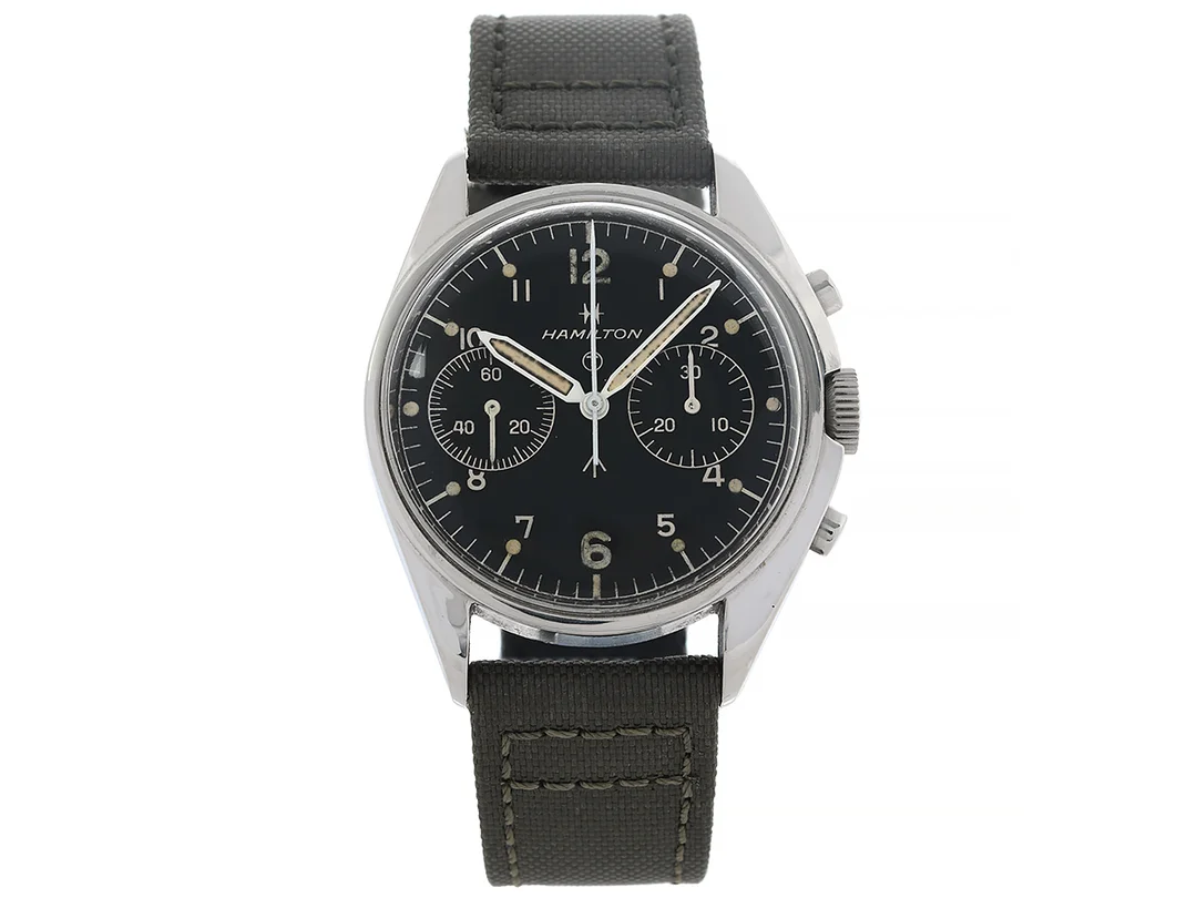HAMILTON, "6BB", Cal Valjoux 7733, Boett nr. 1395311, kronograf, herrur, 39 mm, stål, manuell, plexiglas, miltärstämplar (6BB/924-3306 / 2755/72), läderband, ca 1972. — Klockor/Hamilton — Kaplans