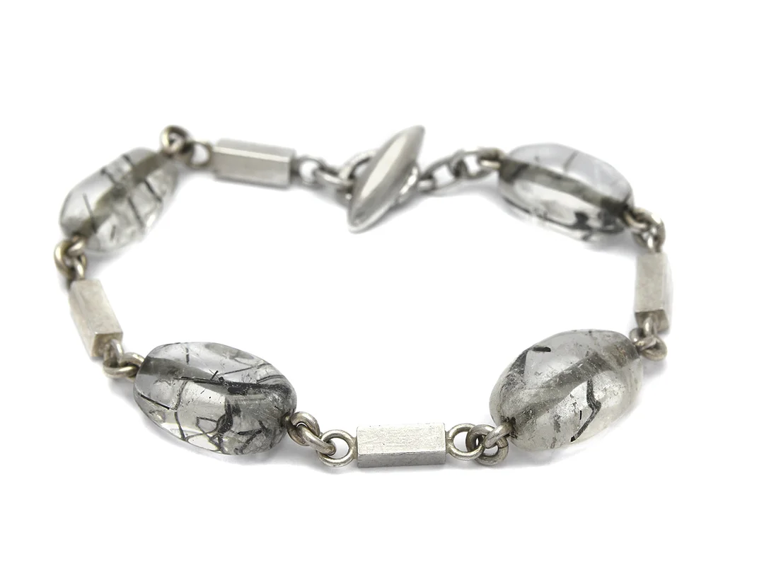 ARMBAND, silver, rutilkvarts, Arvo Saarela, Enköping 1961, längd 19,5 cm, vikt 20 g. — Smycken/Armband — Kaplans