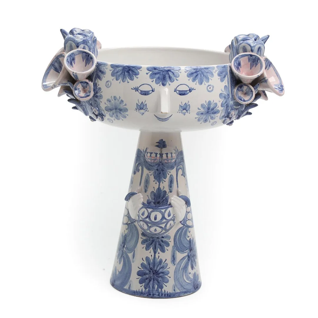 Earthenware centerpiece in the shape of a woman, decorated with blue and pale pink glazes. Signed monogram -79, Danmark, V. 15. H. 40 cm. — Modern Decorative Art — Bruun Rasmussen