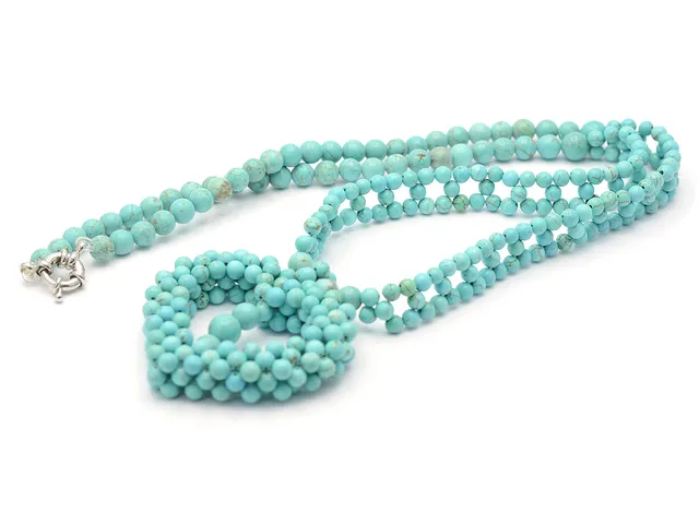 COLLIER, howlit, längd 64 cm, lås i vitmetall.