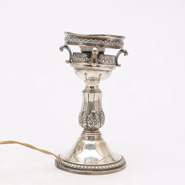 Oil lamp's base in silver, mid 20th Century.