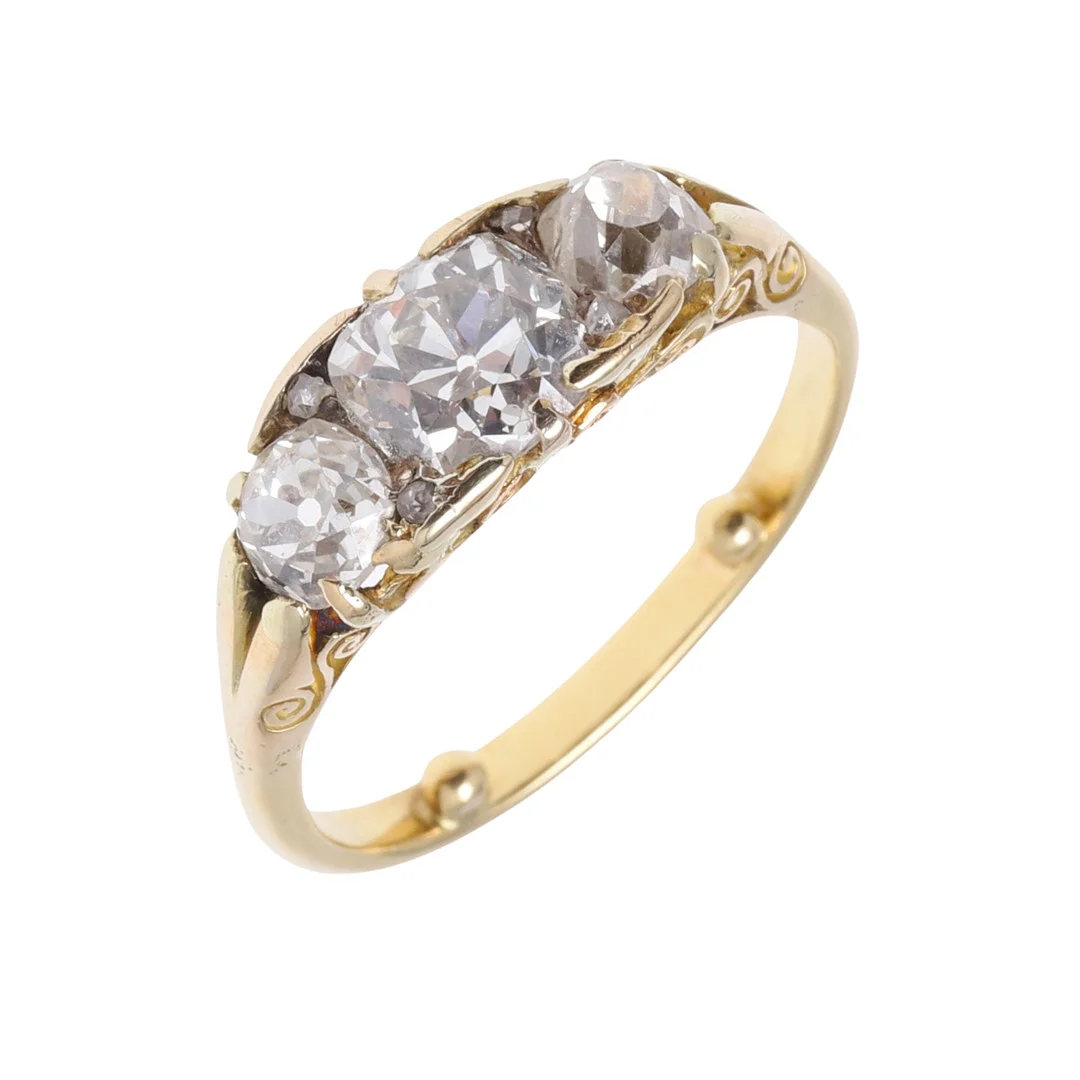 A LATE 19TH CENTURY/EARLY 20TH CENTURY DIAMOND THREE STONE RING. — Rings — Lawrences Auctioneers