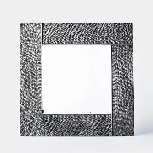BJÖRN TRÄGÅRDH. Table mirror, Firma Svenskt Tenn, Stockholm 1930, model A 1598, frame in pewter with decoration in relief of snakeskin.