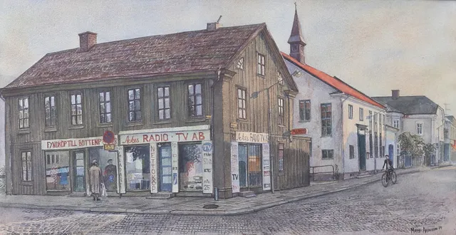 MATS ARONSSON. "Kv. Nunnan från hörnet Norrgatan/Västergatan i Växjö." Akvarell, signerad och daterad 79.