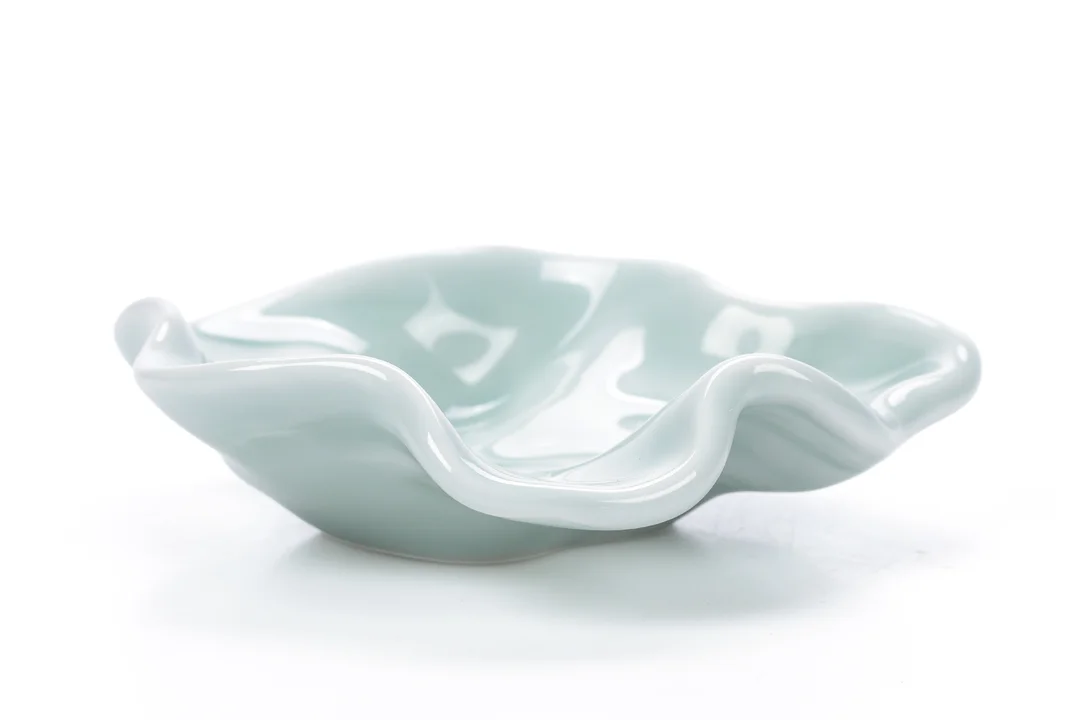 Arje Griegst for Royal Copenhagen. Small bowl, celadon glaze — Glass, porcelain and ceramics/Vases, bowls, dishes — Lauritz