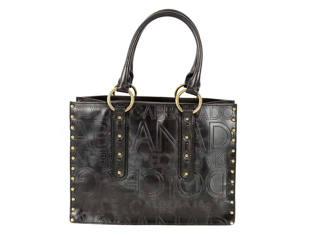 VÄSKA, DOLCE&GABBANA, svart präglat (dolce&gabbana) läder (, gulmetalldetaljer, 32x24x13 cm, dustbag. — Accessoarer/Väskor — Kaplans