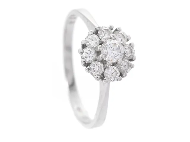 RING, 18K vitguld, briljantslipade diamanter ca 0,62 ctv, ca TW/VS, stl 17,75 mm, vikt 2,4 g.