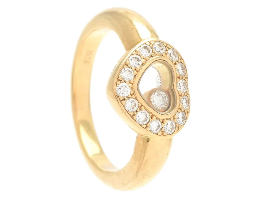 CHOPARD, ring, Happy diamonds, 18K guld, 15 briljantslipade diamanter ca 0,32 ctv , stl 15,25 mm, vikt 6,1 g. — Smycken/Ring — Kaplans