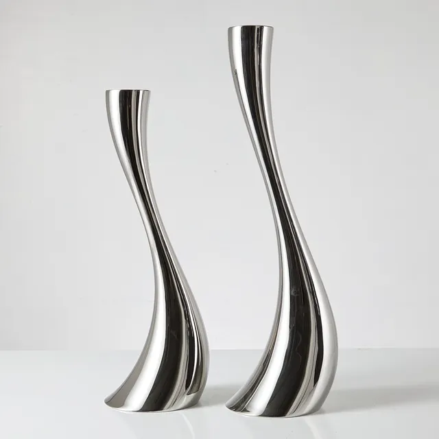 CONSTANTIN WORTMANN. Golvljusstakar, 1 par, "Cobra", ljushållare, design för Georg Jensen, i originalkartonger.