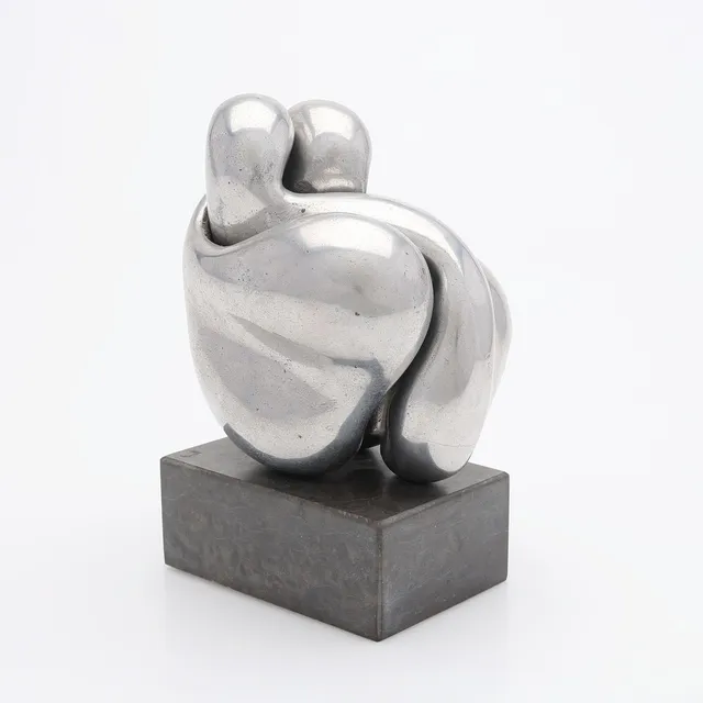 EVA ACKING. TVÅDELAD SKULPTUR, ALUMINIUM PÅ STENSOCKEL, MONOGRAMSIGNERAD, DATERAD -73, NUMRERAD 1/10.