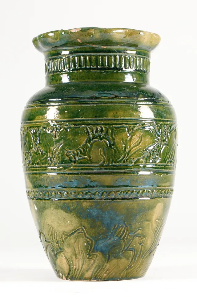 Thorvald Bindesbøll. Vase of fired clay, decorated with green glaze