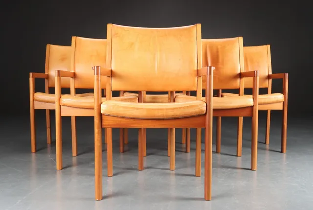 Christian Hvidt. Six armchairs in mahogany and nature leather (6)