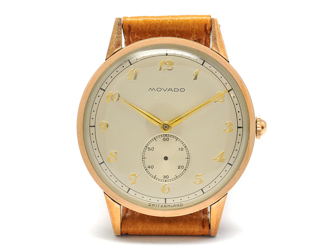 MOVADO, herrur, 36 mm, Cal 470, Ref nr. 14828, Boett nr. B479741, stål/rosa guld, manuell, plexiglas, liten sekundvisare saknas, skadad urtavla (8/10), defekt, läderband, originalspänne i gulmetall, ca 1950. — Klockor/Movado — Kaplans