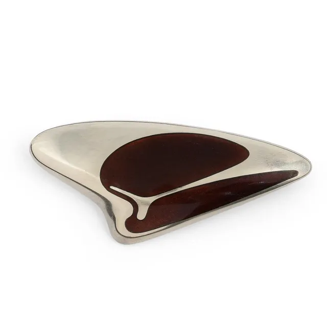 A brooch set with brown enamel, mounted in sterling silver. Design no. 314. Weight app. 21 g. L. 7 cm. Georg Jensen after 1945.
