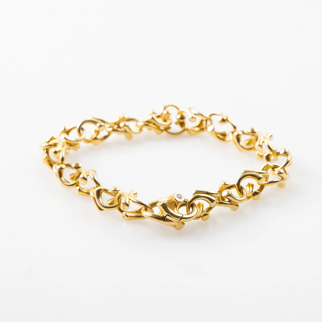 REGITZE OVERGAARD (DANMARK FÖDD 1946). För Georg Jensen, armband 'Magic' i 18K guld. — Bracelets — Stockholms Auktionsverk Helsingborg