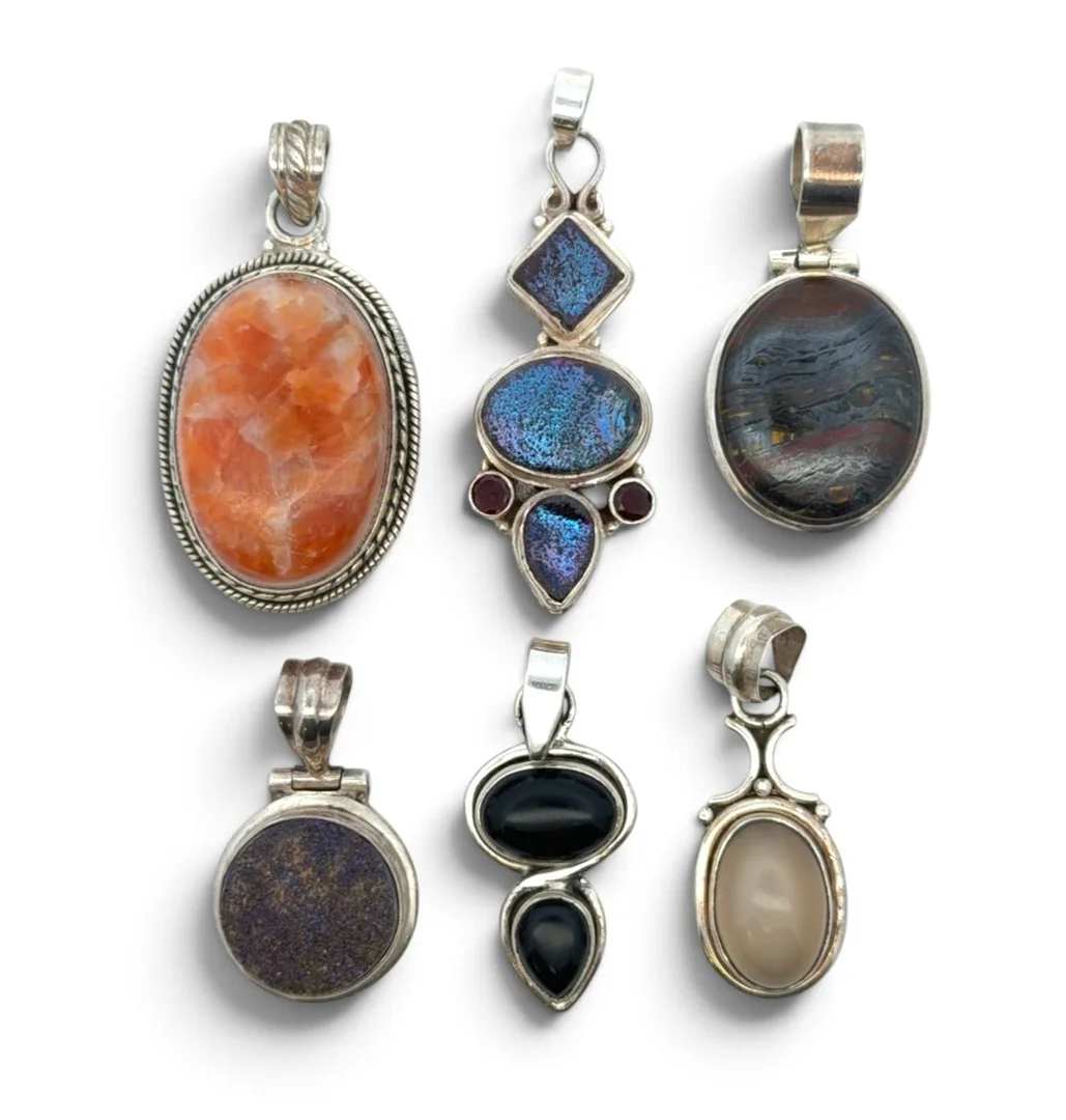 SIX SILVER AND GEMSTONE PENDANTS. — Brooches & Pendants — Griffin’s Auctioneers