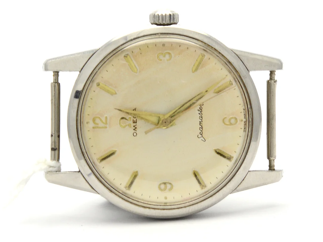 Omega Seamaster, herrur, manuell, stål, skadad urtavla, repigt plastglas, utan länk — Klockor/Omega — Kaplans