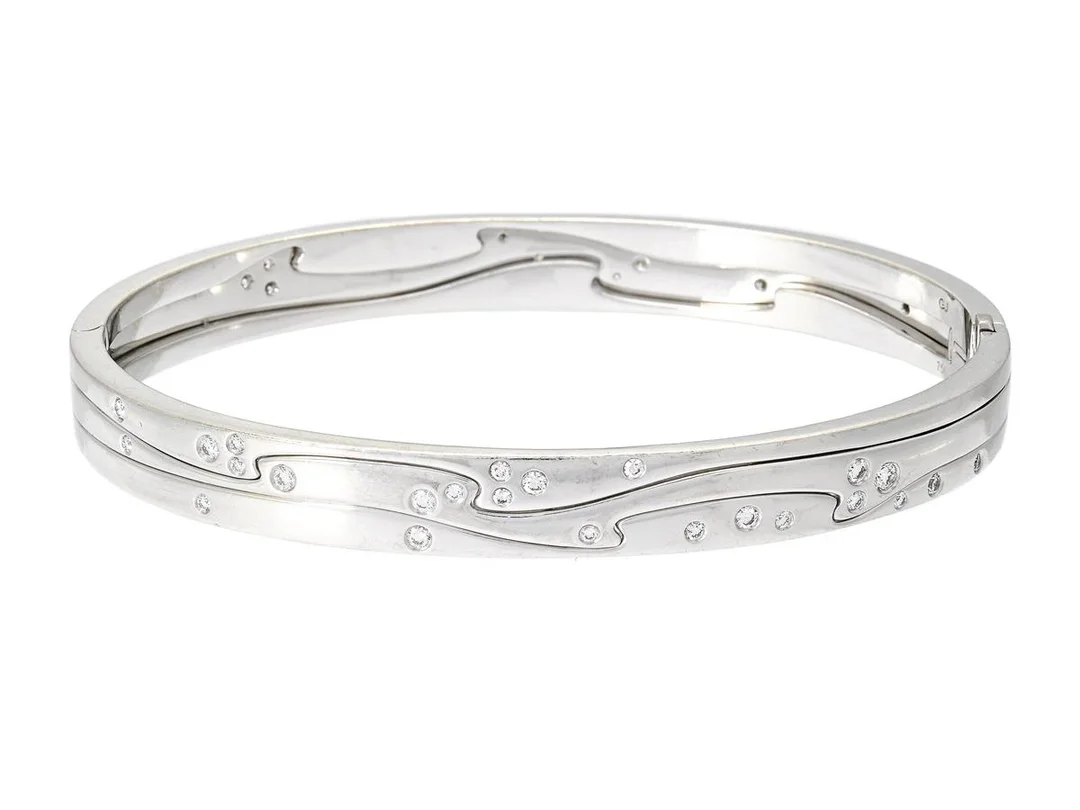 GEORG JENSEN, armband, Fusion, 18K vitguld, briljantslipade diamanter, Nina Koppel, stl L, vikt 38,0 g, originaletui. — Smycken/Armband — Kaplans