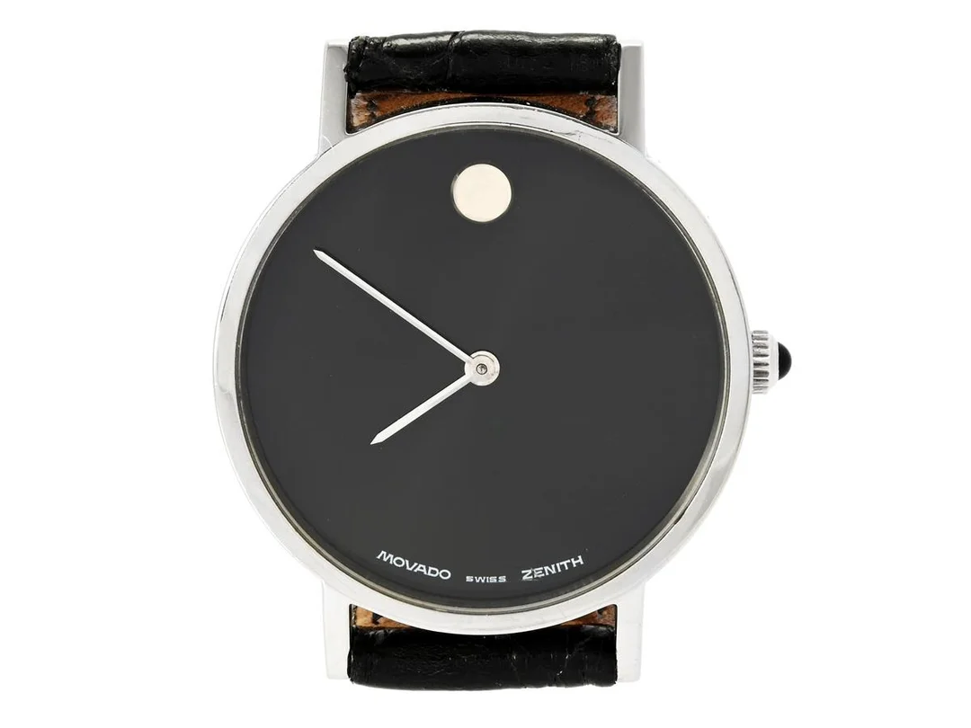 MOVADO/ZENITH, Museum, Cal 30.5, Boett nr. 01.2320.305 (K.B), herrur, 30,5 mm, stål, manuell, mineralglas, läderband, ca 1990. — Klockor/Movado — Kaplans