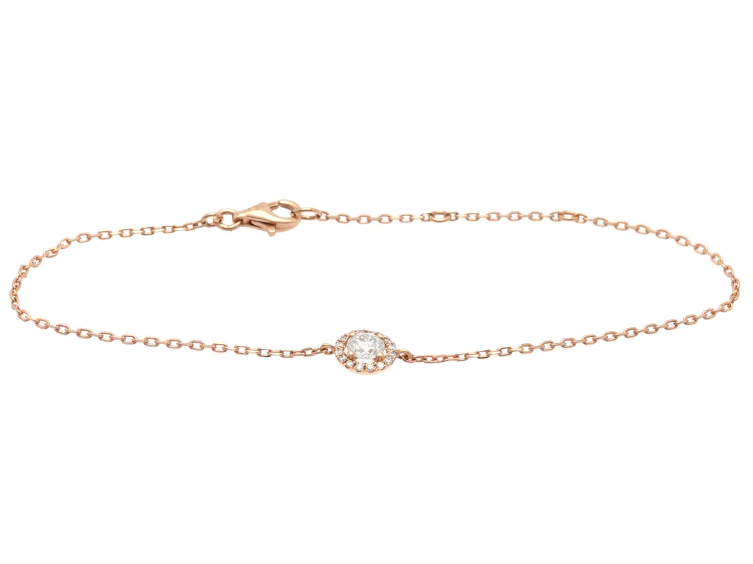 ARMBAND, 18K roséguld, briljantslipad diamant ca 0,30 ct, ca TW/SI, mindre briljanter ca 0,08 ctv, längd 15,5/17/18,5 cm, vikt 1,7 g. — Smycken/Armband — Kaplans