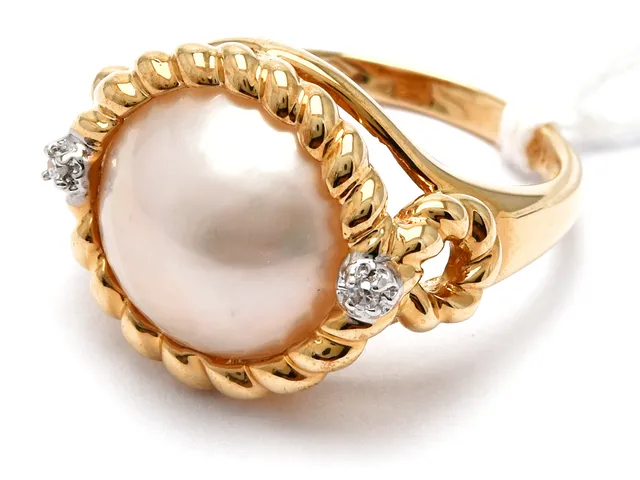 Ring med diamanter 14K 4,4g Ø16½, 2xca0,01ct (åttkantsslipade), med plast pärla