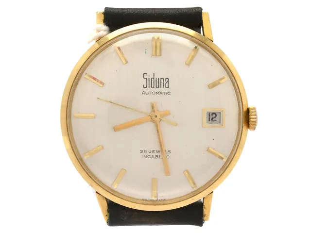 Siduna automat, 18K, herrur, 34mm, datum, plastglas, bucklor på boetten, med svart läderarmband