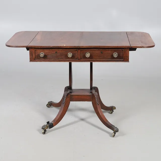 A MAHOGANY SOFA TABLE.