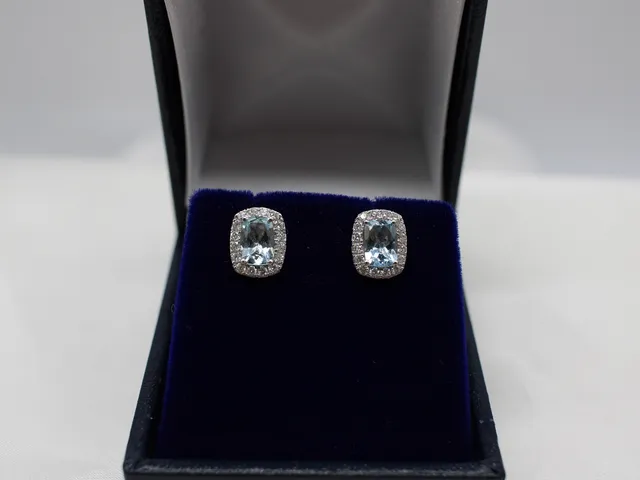 9K GOLD, AQUAMARINE & DIAMOND EAR STUDS.