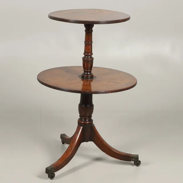 A GEORGE III MAHOGANY TWO-TIER DUMB WAITER.