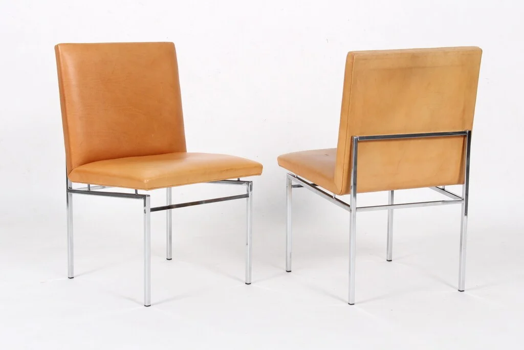Poul Nørreklit. Pair of lounge chairs, steel and leather, 1960s (2) — Furniture/Chairs — Lauritz