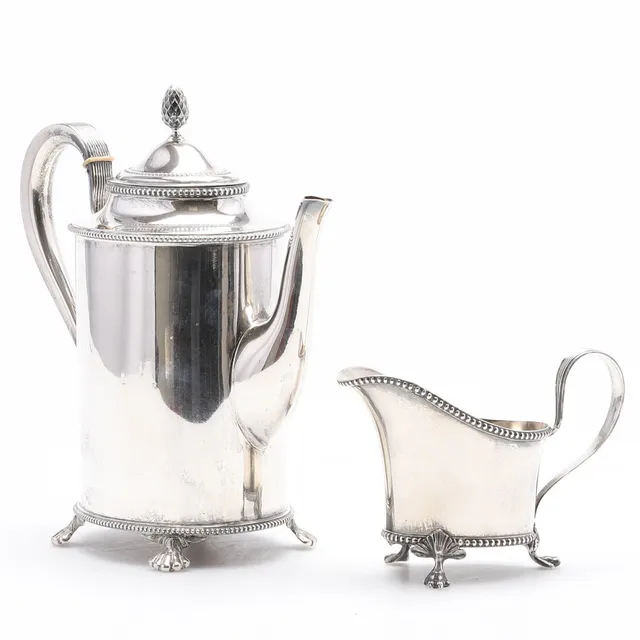 ANDERS NILSSON. Kaffekanna samt gräddkanna, silver, gustaviansk stil, Lund 1911.
