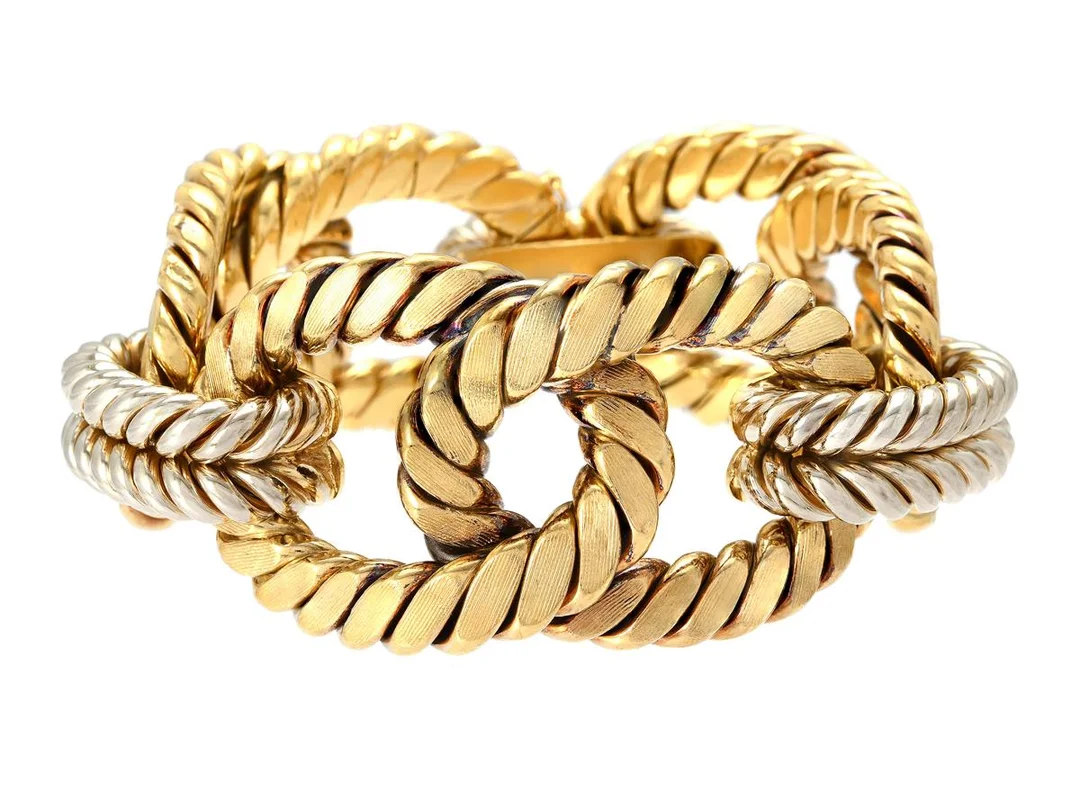 ARMBAND, 18K guld/vitguld, Italien 1960-tal, Fransk kontrollstämpel, bredd 34 mm, längd 18,5 cm, vikt 124,8 g. — Smycken/Armband — Kaplans