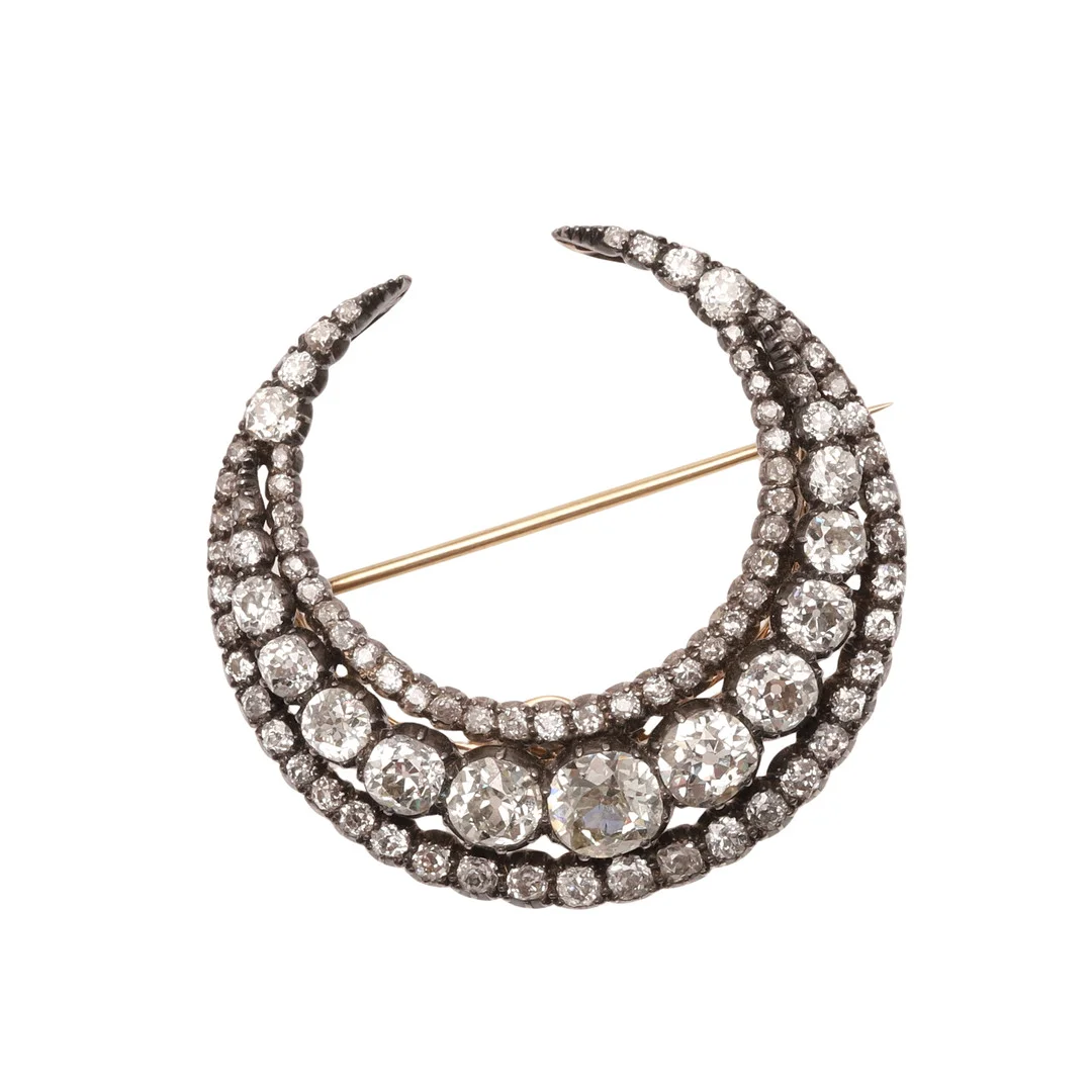A VICTORIAN DIAMOND CLOSED CRESCENT BROOCH PENDANT. — Brooches & Pendants — Lawrences Auctioneers