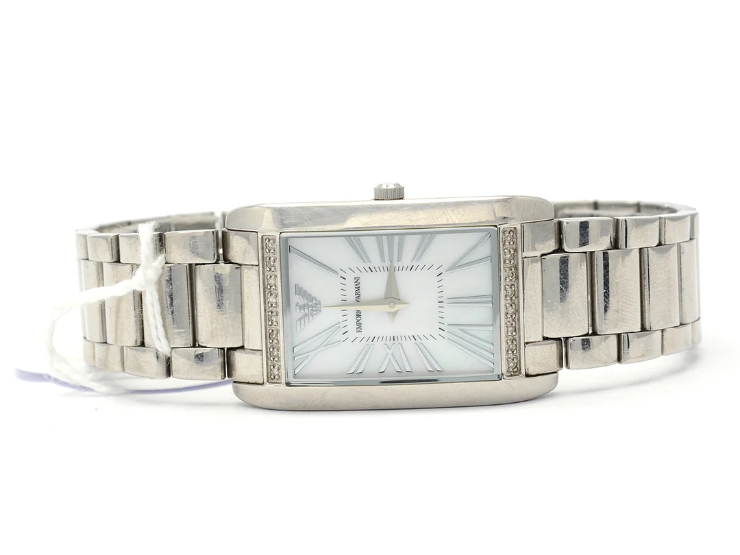 Damur Emporio Armani quartz pärlemotavla stål med diamanter mineralglas,ngt repigt glas,krävs batteribyte — Klockor/Emporio Armani — Kaplans