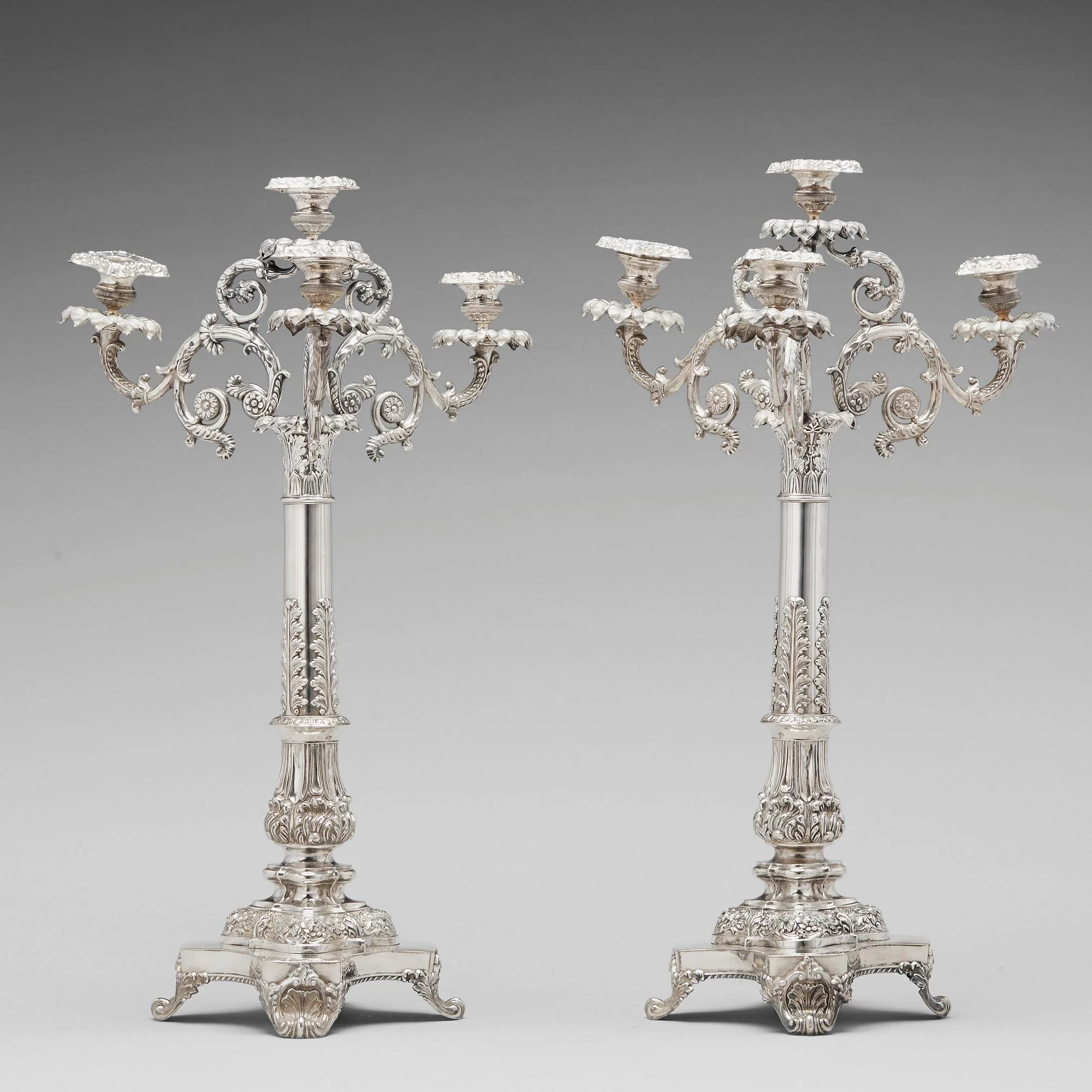 Gustaf Möllenborg, kandelabrar för fyra ljus, ett par, silver, Stockholm 1838. Empire. — Bukowskis