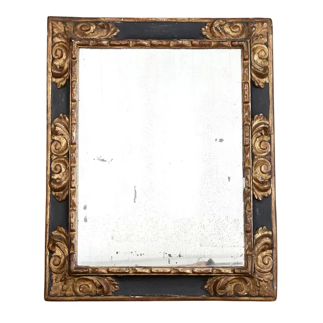 Mirror with Baroque frame in carved, painted and gilt wood, 17th Century.