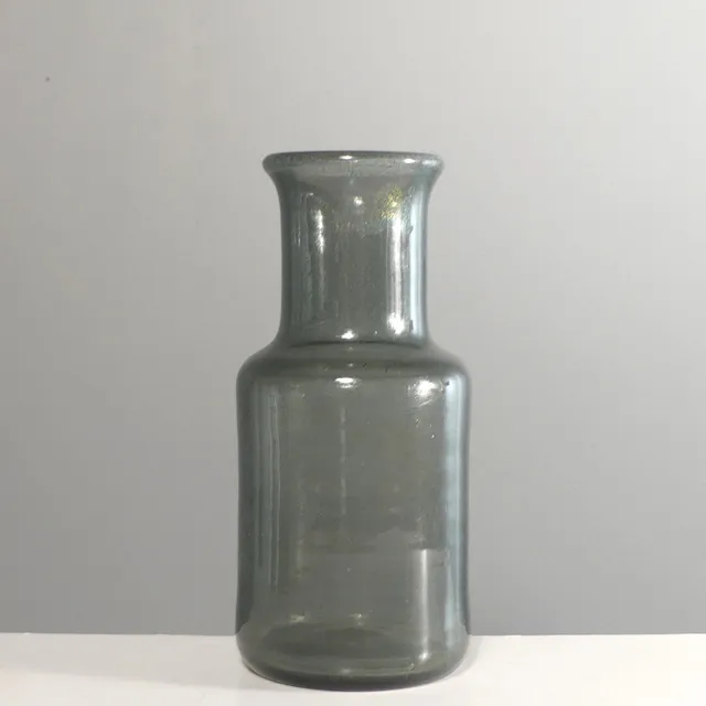 ERIK HÖGLUND. vas, glas. Signerad.
