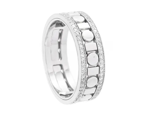 DAMIANI, ring, Belle Epoque, 18K vitguld, briljantslipade diamanter 0,37 ctv, ca TW/VS, mittdelen är rörlig, bredd 5,7 mm, stl 53 (ca 16,75 mm), vikt 5,5 g.