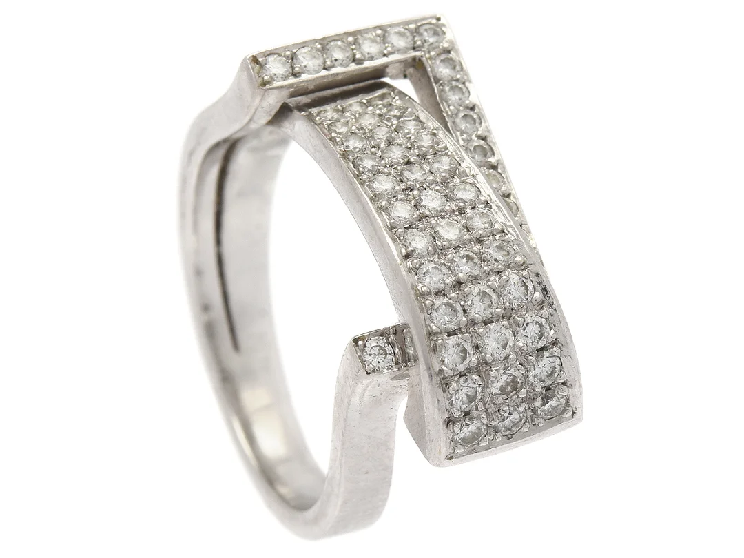 RING, 18K vitguld, 51 briljantslipade diamanter ca 0,60 ctv, ca W(H)/VS, stl 17,25 mm, vikt 8,8 g. — Smycken/Ring — Kaplans