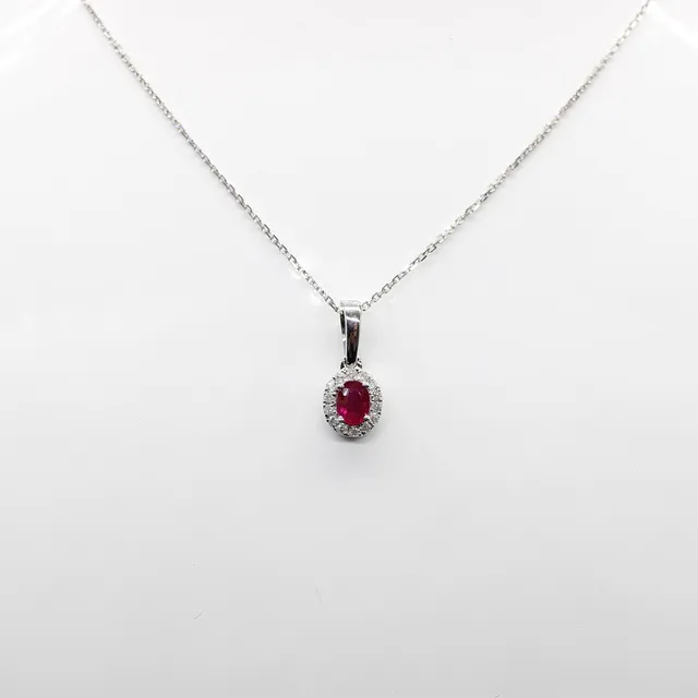 RUBY & DIAMOND PENDANT NECKLACE.