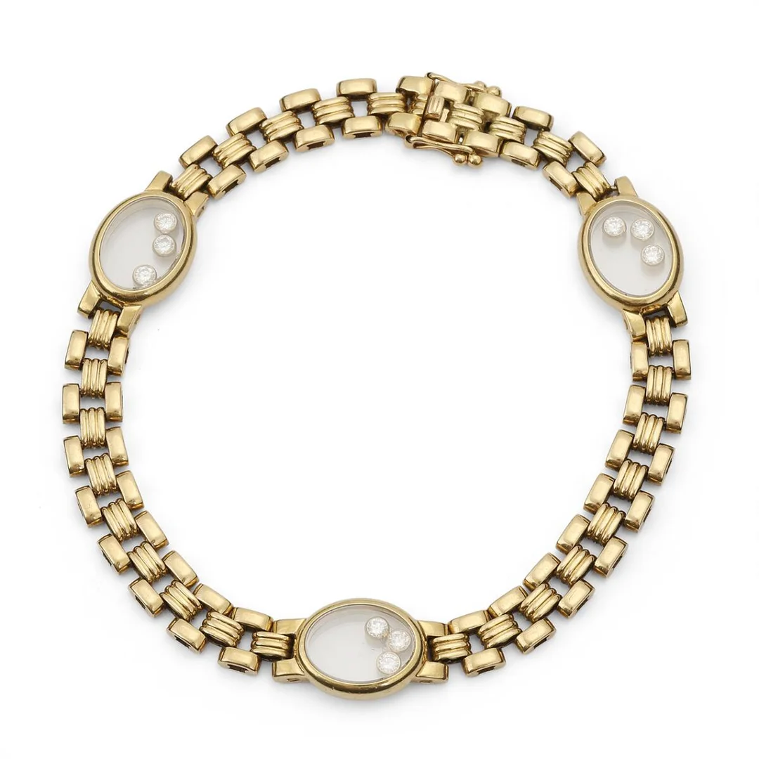 Chopard: A diamond bracelet set with nine movable diamonds, mounted in 18k gold. Serial no. 6064490. L. 20.2 cm. — Jewellery/Bracelets — Bruun Rasmussen