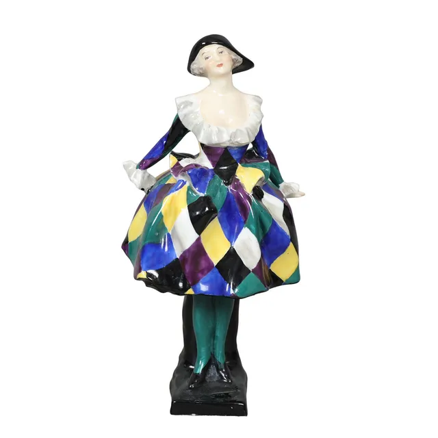 A ROYAL DOULTON FIGURINE, HARLEQUINADE HN 585.