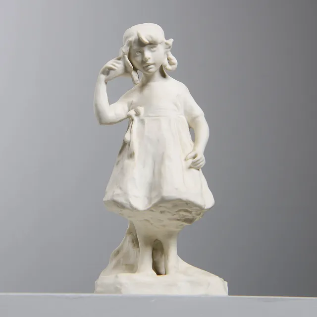 ALICE NORDIN. Figurin, Flicka med snäcka, parian, Gustavsberg, signerad.