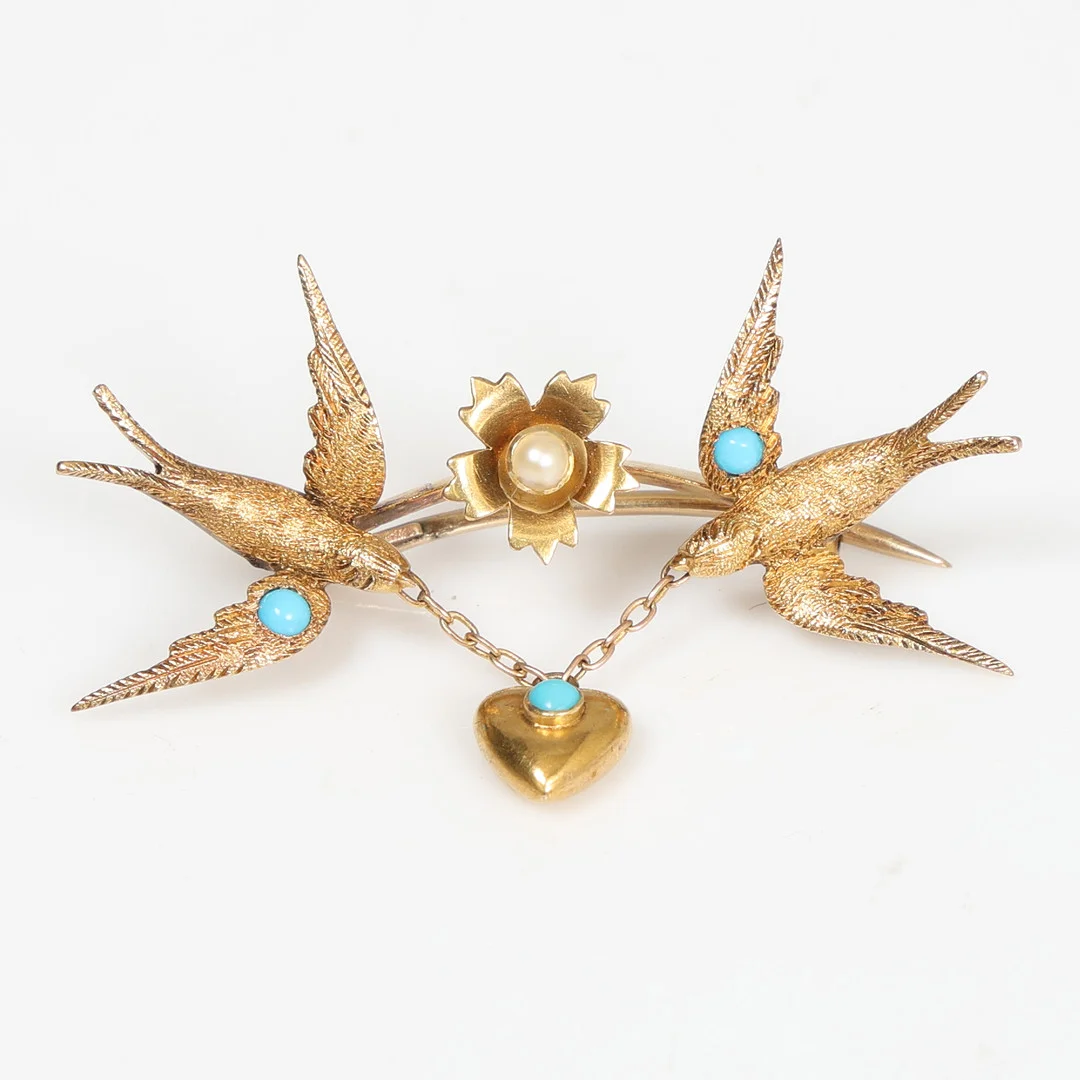 A VICTORIAN YELLOW METAL, TURQUOISE AND PEARL SWALLOW & HEART BROOCH. — Brooches & Pendants — Bishop & Miller