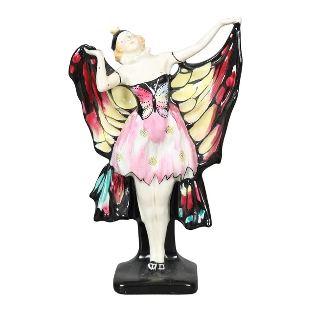 A ROYAL DOULTON MODEL, BUTTERFLY HN 719, DESIGNED BY ARTHUR LESLIE HARRADINE, CIRCA 1925-1938.
