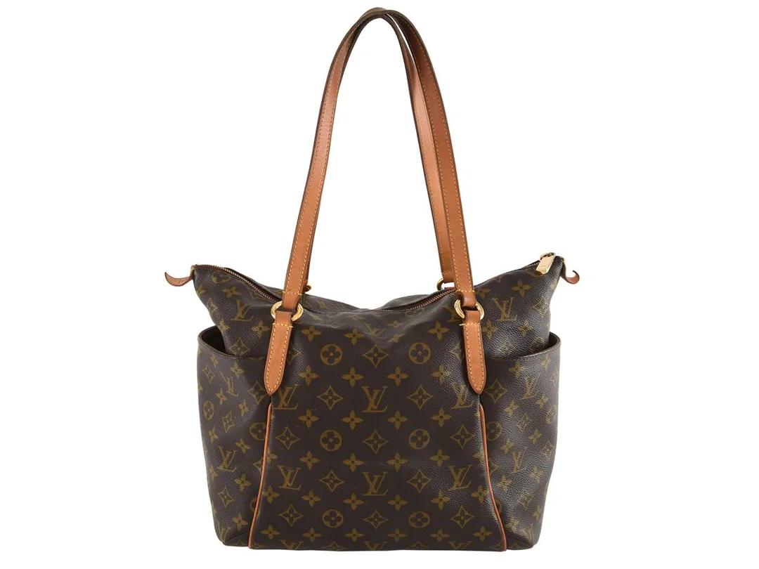 VÄSKA, LOUIS VUITTON, monogram canvas, 32x30x16cm, slitage, fläckar på foder. — Accessoarer/Väskor — Kaplans